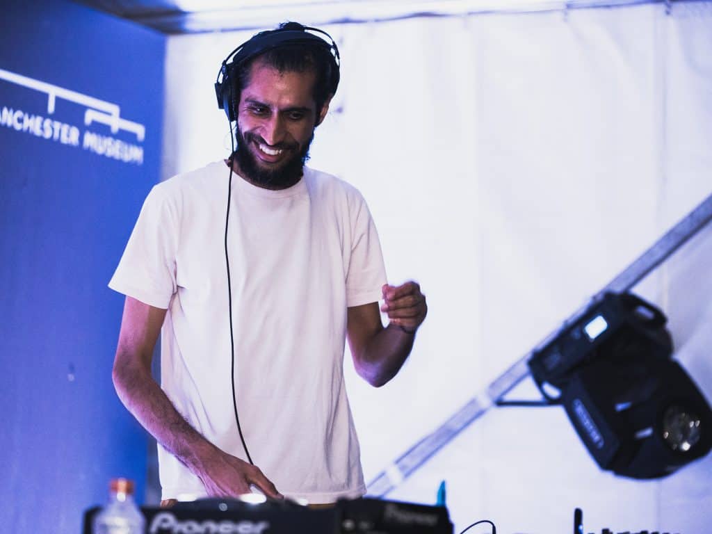 Photograph of south Asian DJ in Manchester Museum